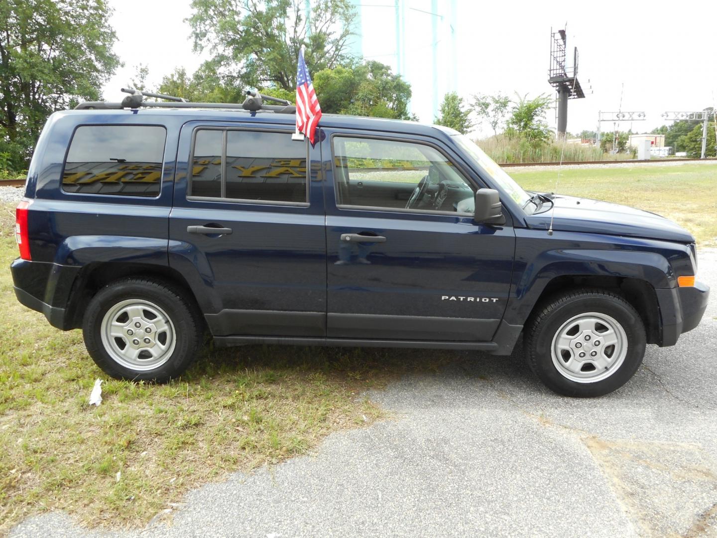 2014 Blue Jeep Patriot Sport 2WD (1C4NJPBA5ED) with an 2.0L L4 DOHC 16V engine, located at 2553 Airline Blvd, Portsmouth, VA, 23701, (757) 488-8331, 36.813889, -76.357597 - ***VEHICLE TERMS*** Down Payment: $999 Weekly Payment: $90 APR: 23.9% Repayment Terms: 42 Months *** CALL ELIZABETH SMITH - DIRECTOR OF MARKETING @ 757-488-8331 TO SCHEDULE YOUR APPOINTMENT TODAY AND GET PRE-APPROVED RIGHT OVER THE PHONE*** - Photo#4